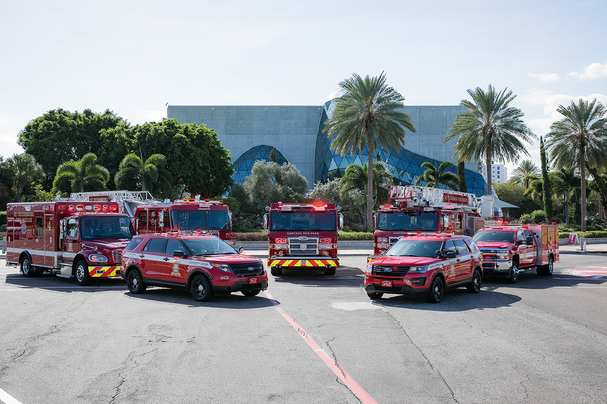 fleet of all various fire vehicles in front of Dali Museum