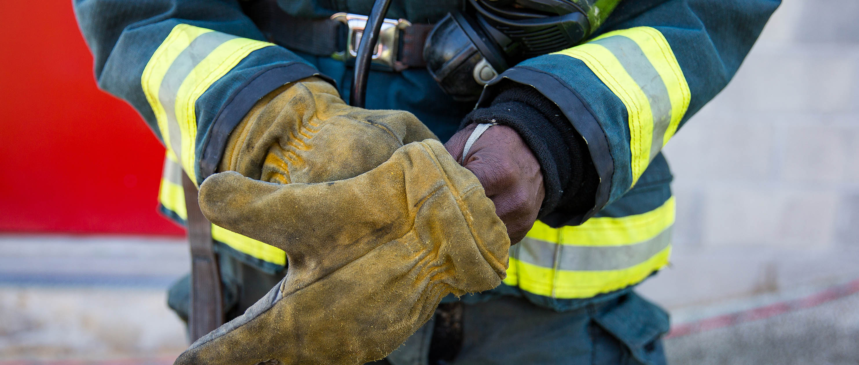 Firefighter hands with gloves